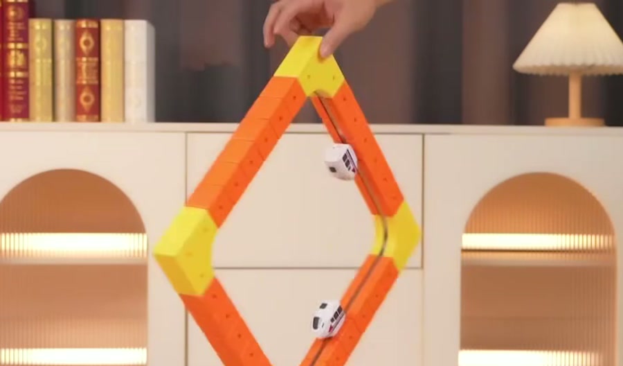 A hand holding a magnetic build