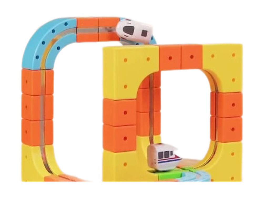 Magnetic track building set with electric train