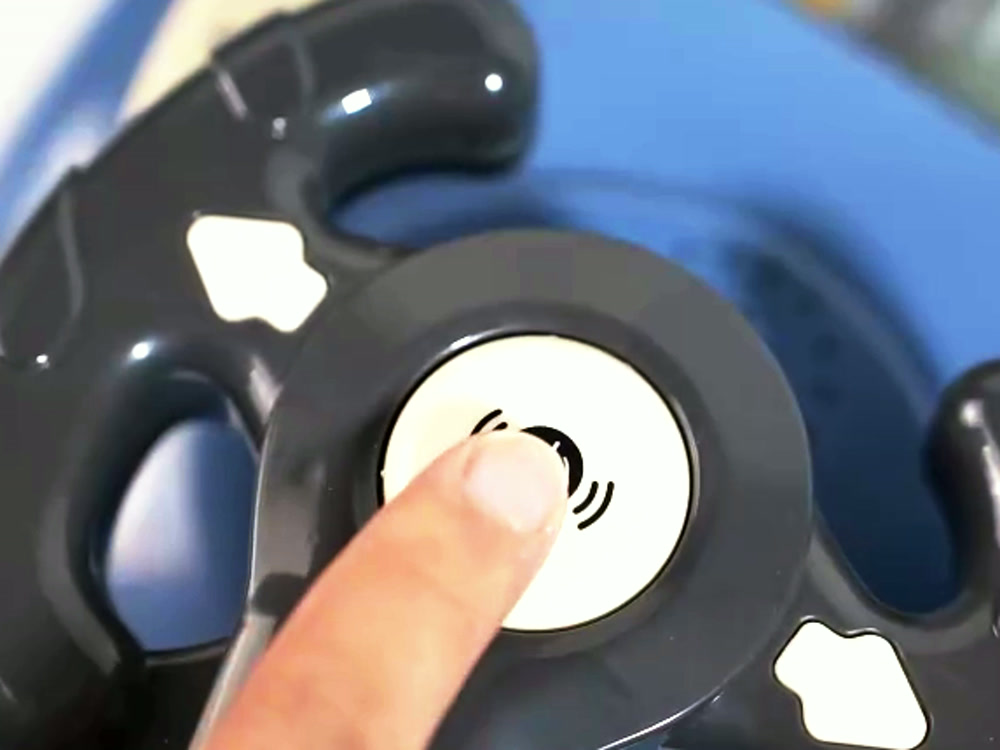 The buttons on the wheel — indicator and sounds